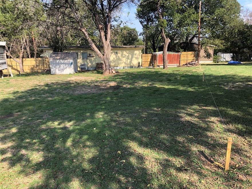 Welcome to 4205 Taos Court in Granbury, Texas!  This is an improved two lot piece of property waiting for your new build!  These lots are joined and are located in a cul-de-sac that allows for easy access and privacy.  The property has all the convivence of being located near local amenities within the HOA community of Indian Harbor!  Come and enjoy bringing your family to visit all that this community has to offer!