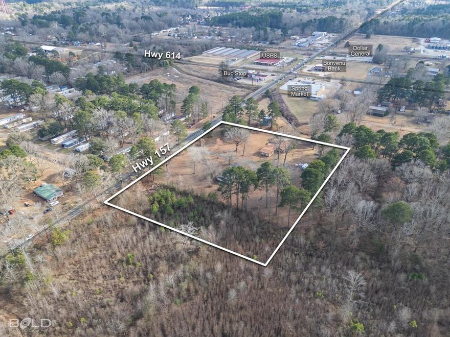 Prime commercial land opportunity in a rapidly growing area! This 4.87-acre parcel, priced at $10 per sqft or $2,121,372 for the entire site, offers approx. 550 feet of road frontage on N Elm (HWY 157) with a traffic count exceeding 10,000 cars per day. A new 200-ft commercial boulevard with spacious 15-ft medians is being developed adjacent to the property, enhancing accessibility and visibility. Located just minutes from I-20, this site is fully equipped with water, sewer, curbs, and gutters, making it development-ready. Directly across the street, Legacy Point Subdivision is under construction, bringing hundreds of new rooftops to the area. This is an excellent location for retail, office, or mixed-use development in a high-growth corridor. Don’t miss this incredible investment opportunity!