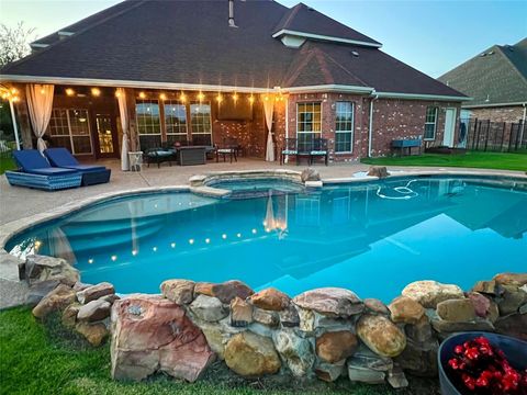 Photo of 10414 Broadmoor Lane, Rowlett, TX 75089 (MLS # 21233578)