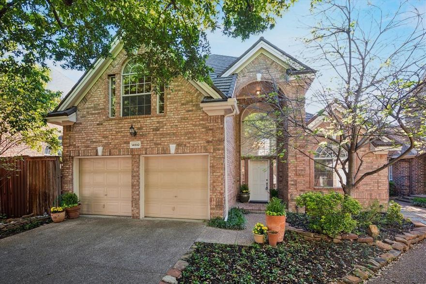 LIVE HERE! Light filled Grand Addison home sits in a tree-lined cul-de-sac. This private 3 bedroom home offers 2 living areas and 2 downstairs bedrooms with a full bath. First floor living area centered by gas fireplace and views of private patio. Fresh paint throughout living areas. Roomy kitchen boasts updated tile floor and back splash, plenty of storage, pantry, microwave and recently purchased drop in oven.

Adjacent breakfast area enjoys large windows exposing the sunny, east-facing back patio, perfect for ‘al fresco’ dining and container gardening.

The open staircase leads to 2nd floor where the spacious loft offers another living area, perfect for home office or a private workout space.
Retreat-like primary bedroom is generously sized and secluded. The primary bathroom offers calm with a jetted tub, walk-in shower, and dual sinks. Two well sized primary closet will not disappoint! 

Desirable subdivision boasts tree-lined sidewalks, walking trails, pond and wildlife. Close proximity to the Addison Athletic Club, an impressive membership facility for Addison residents. Well known Addison restaurants and night life can be found nearby. Easy access to both DNT and 635.

NOTE: All 'foggy' window panels have been replaced. Home boasts a steel shingled roof (2011) with a transferable warranty. 
A radiant barrier was installed in the attic for improved energy efficiency and comfort.