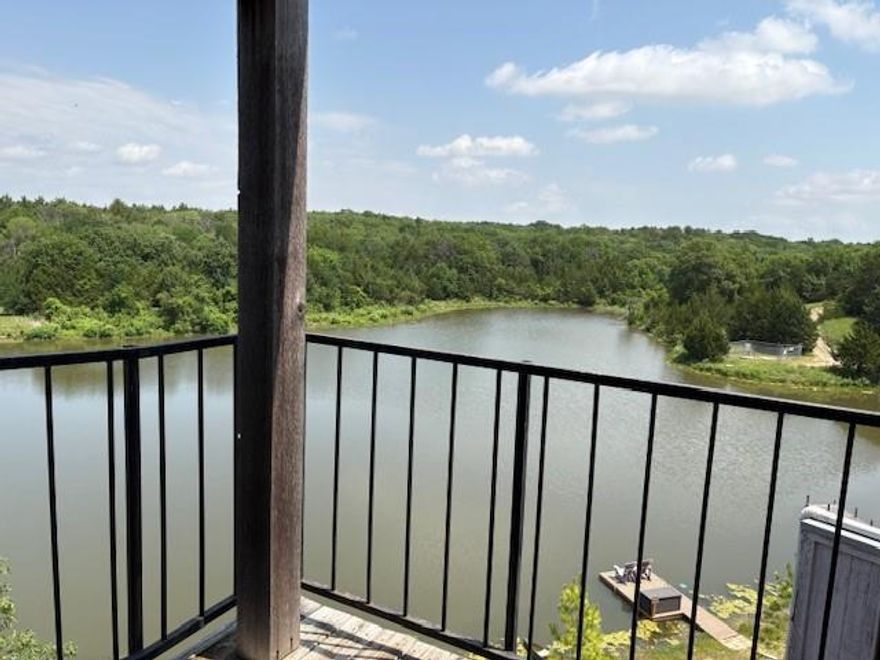 Opportunity is knocking!  This corner townhome is 3 stories with multiple balconies and stunning water views of the pond in an excellent Tanglewood community!!  This fixer upper is priced well below market value and perfect for investors and homeowners alike.  Make it your own and relax just a stone's throw from Tanglewood Golf Course designed by golfing legend Arnold Palmer and the beautiful Lake Texoma where the striper bass are biting and water skiing, boating, sailing, and fun in the sun await.  Less than 30 minutes from Sherman which many are touting as developing the silicon valley of TX with TI and GlobiTech making strides in the semiconductor and high-tech industry.  Minutes from the brand new Margaritaville Resort currently slated to open sometime in 2026, opportunity for 125 Greenway Bend abounds.  The lake is calling--it's time to live your best life, and it doesn't get any better than this!