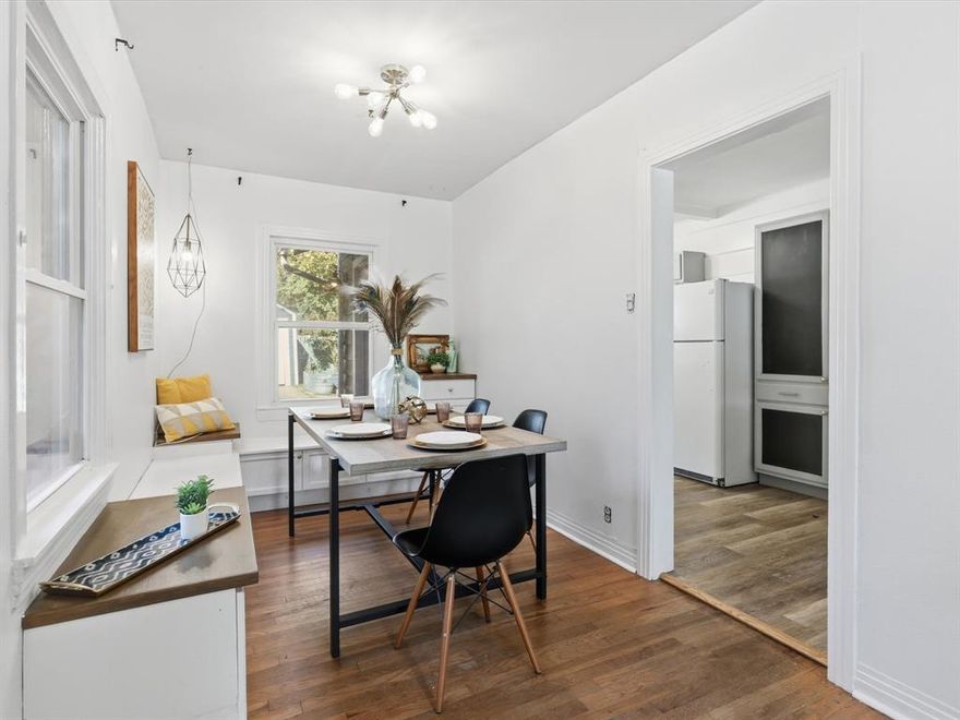 Unbelievable price in desirable Arlington Heights. Charming home offering great bones and plenty of potential. This three bedroom, one full bath is ready for it's next chapter. Step inside to discover original hardwood floors. A beautiful fireplace is perfectly positioned to enjoy from either the living room or dining. A custom banquette wraps the dining room to maximize seating and for additional storage. An updated kitchen is set up for efficiency and has the opportunity for more cabinetry if desired. In 2017 the exterior was given an upgrade with new hardy board siding, a fresh coat of paint, a new roof and gutters, a new garage door and an outdoor covered entertaining area. The home is conveniently located to Dickie's arena, musuems, Botanic Gardens, the Fort Worth Zoo just to name a few locations.