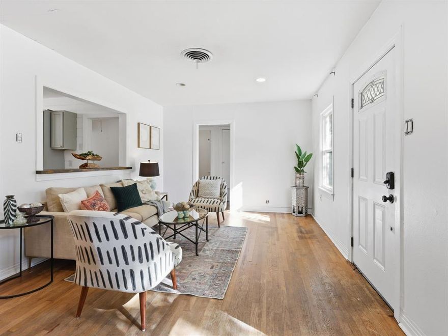 Unbelievable price in desirable Arlington Heights. Charming home offering great bones and plenty of potential. This three bedroom, one full bath is ready for it's next chapter. Step inside to discover original hardwood floors. A beautiful fireplace is perfectly positioned to enjoy from either the living room or dining. A custom banquette wraps the dining room to maximize seating and for additional storage. An updated kitchen is set up for efficiency and has the opportunity for more cabinetry if desired. In 2017 the exterior was given an upgrade with new hardy board siding, a fresh coat of paint, a new roof and gutters, a new garage door and an outdoor covered entertaining area. The home is conveniently located to Dickie's arena, musuems, Botanic Gardens, the Fort Worth Zoo just to name a few locations.