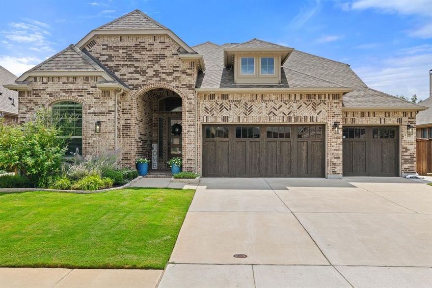 $15k Lender Credit With Preferred Lender!! Discover your dream home in the highly sought-after Trinity Falls community! This stunning custom built Chesmar home boasts 4 spacious bedrooms, 3 full baths, and a versatile study that can easily serve as a 5th bedroom or playroom. The heart of the home is the impressive kitchen, featuring stainless steel appliances, a double oven, a convenient pot filler, a gas cooktop, a butler's pantry, and an oversized island—ideal for entertaining family and friends! The breakfast area features a custom dry bar with two built-in wine coolers adjacent to the kitchen. Unwind in the luxurious primary suite, complete with an ensuite bath featuring double vanities, a separate shower, and a soothing garden tub. Two additional bedrooms and a full bath are conveniently located on the main floor. Venture upstairs to discover a massive in-law suite or second primary bedroom, complete with its own ensuite bath for added privacy. Custom built cabinets in laundry room and mudroom with passthrough door to primary for easy access! Step outside to enjoy al fresco dining on your expansive patio or gather around the cozy outdoor fireplace for those chilly evenings. The Trinity Falls community offers an array of resort-style amenities, including two sparkling pools, pickleball courts, splash pads, 5 playgrounds, a dog park, a state-of-the-art fitness center, catch-and-release ponds, scenic jogging paths, and the new Frazier Elementary School along with three early learning centers. With exciting events happening almost every weekend, Trinity Falls is not just a place to live—it's a vibrant lifestyle waiting for you! Walking distance to the Lodge and Frazier Elementary! 5 Minutes to HWY 75 and just a short drive to DFW airport! Don't miss this opportunity to make this home your own!