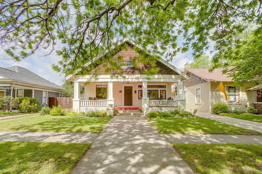 This 1920s beauty is one of the best examples of the Fairmount charm that historic home buyers love!  From the moment you step onto the welcoming front porch, the Craftsman details and architectural windows tell the story of a home that has been loved throughout the years.  This home has three bedrooms and two baths in a practical living layout that suits modern day needs.  Hardwood floors flow throughout, leading you through generously sized rooms filled with natural light and the kind of woodwork you just don't find in new construction.  Original hardwoods throughout- not a tile in sight!   The updated kitchen is the heart of the home — featuring double ovens, tons of storage, and large windows. A secondary dining space offers flexible possibilities to suit your lifestyle.  Both bathrooms offer the romance of clawfoot tubs, while the primary ensuite bath adds an oversized shower.  One additional bonus is the large utility room with ample storage.  The backyard is designed for outdoor living — a generous screened in deck for comfort, and tons of space for gardening or enjoying the sunset. This is a true Fairmount classic, ready for its next chapter.