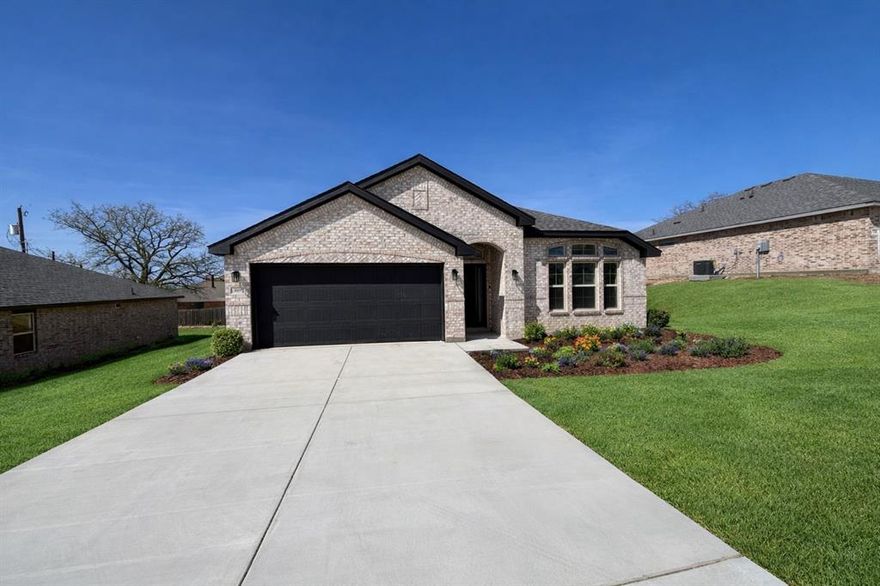 Welcome home to Cheldan Homes’ newest community in Graham, Texas—where comfort, connection, and everyday moments come to life. This inviting 3 or 4-bedroom, 2-bath, and a study option home offers just under 1,900 square feet of thoughtfully designed space that feels both open and ??? from the moment you walk in. Picture yourself stepping into a bright, open living area where the kitchen and family room flow effortlessly together, perfect for hosting friends, gathering with loved ones, or simply enjoying a quiet evening while dinner simmers and the game plays in the background. The oversized kitchen island, finished with beautiful granite countertops, becomes the heart of it all, a morning coffee spot, homework station, and gathering place all in one. Outside, a lush, fully sodded yard with built-in irrigation invites you to slow down and enjoy the simple things weekend barbecues, kids playing in the grass, or peaceful Texas sunsets right from your own backyard. Set within a growing community designed with ease in mind, this home offers more than just a place to live; it’s where memories are made, routines feel effortless, and life feels just a little more connected.