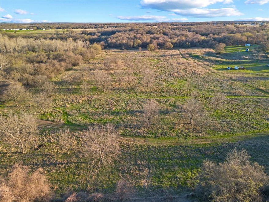 Discover the freedom and opportunity this exceptional 10-acre tract in Parker County has to offer. Currently ag-exempt and with no known restrictions, this property is a rare find—perfect for building your dream home, creating a weekend retreat, or holding as an investment.

The land is level, usable, and thoughtfully positioned to provide both privacy and flexibility. A seasonal creek borders one side of the property, adding natural character and a peaceful setting to enjoy year-round.

Whether you're looking to build, bring animals, or simply enjoy wide-open space, this property offers endless possibilities in a growing area of Parker County.