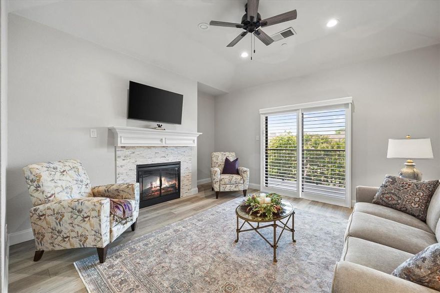 PRICE IMPROVEMENT plus HOA DUES have been paid up to May 2026! Welcome to this beautiful condo offering views of Lake Ray Hubbard and an impressive list of upgrades throughout. From the moment you arrive, you’ll notice the attention to detail and thoughtful improvements that make this condo a truly special place to call home! Enjoy fresh interior paint, luxury vinyl plank flooring, new front door with heavy duty storm door  and plantation shutters on every window—including the sliding balcony door. The inviting living space features an updated electric fireplace with a tiled border, creating a cozy atmosphere with a modern edge. The kitchen has been upgraded with countertops, backsplash, sink, faucet, and garbage disposal, along with an electric range and microwave. Updated cabinet hardware and recessed lighting added throughout the home add a clean, contemporary touch.The primary bath has been completely transformed, featuring a walk-in glass-door shower with modern fixtures and bench, a soaking tub, a sleek double-sink vanity with countertops, elegant light fixtures and crystal cabinet pulls.  The guest bathroom has also been tastefully renovated with tub, glass sliding door, fixtures, updated vanity with countertop and sink, and a toilet.  Hot water heater and HVAC unit replaced . Extra blown in insulation in attic. Exterior stairlift added in 2024.   Two assigned carport parking spaces. Located adjacent to one of the community pools and just steps from the serene shores of Lake Ray Hubbard and within walking distance to the Harbor, this condo is low-maintenance lake living at its finest, with no detail overlooked. Don’t miss your opportunity to own this stunning, move-in-ready gem with lake and pool views!