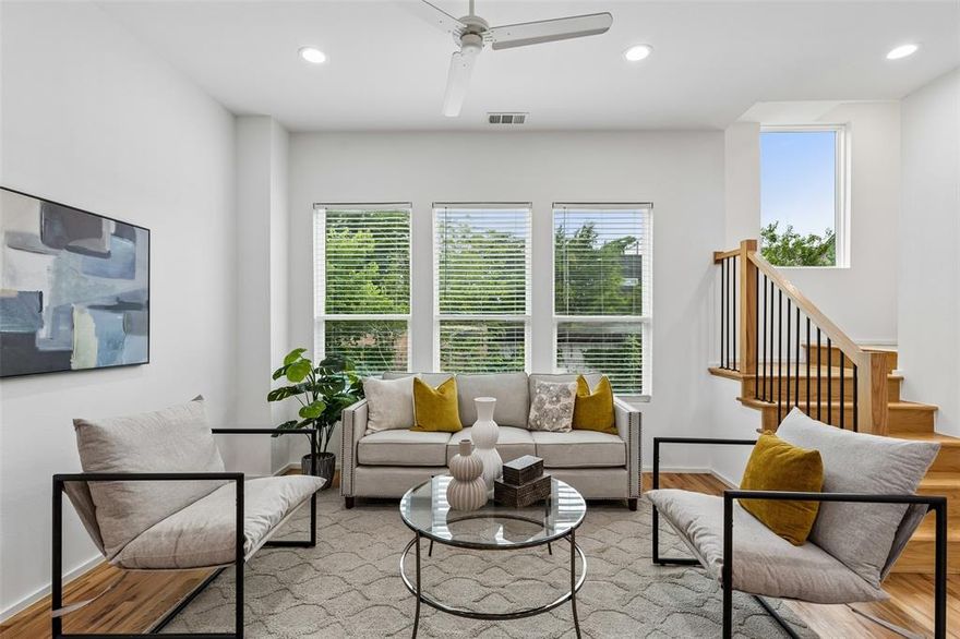 Tucked into one of East Dallas’ most connected pockets, 5647 Live Oak delivers low-maintenance luxury just minutes from Lakewood and Lower Greenville. This three-story townhome-style condo lives larger than expected, with real hardwood floors and abundant natural light throughout. The designer kitchen pairs quartz counters, stainless steel appliances, and ample built-ins with an open, functional layout. Both bedrooms are generously sized, each with a designer ensuite bath, large custom closet, and vaulted ceilings that add volume and light. The first-floor office offers flexible space for work, fitness, or a second living area. Storage is thoughtfully integrated throughout, including custom closet systems and a spacious garage with additional storage. A fenced front yard and secured pedestrian gate provide privacy and convenience. Lock-and-leave living without compromise—modern, efficient, and ideally located. One of 5 available units.