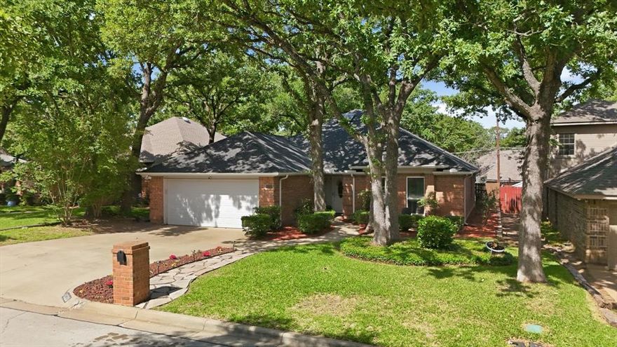 MULTIPLE OFFERS RECEIVED. BEST AND FINAL DUE MONDAY MAY 11 AT NOON. Tucked into a quiet, established neighborhood shaded by mature trees, this charming single-story ranch offers comfort, style, and versatility in a prime South Arlington location. From the moment you arrive, you’ll appreciate the inviting curb appeal and the sense of tranquility that surrounds the home.

Inside, the thoughtfully updated interior features a spacious, oversized living room centered around a classic brick fireplace—perfect for relaxing evenings or entertaining guests. The modern kitchen is both functional and stylish, showcasing stone countertops, stainless steel appliances, ample prep space, and a refrigerator that conveys with the home.

The private primary suite is ideally situated at the back of the home, offering a peaceful retreat complete with a beautifully updated ensuite bath featuring an oversized walk-in shower and dual closets. Secondary bedrooms are generously sized, complemented by newly renovated spacious guest bathroom featuring an expansive vanity with dual sinks, new tub and shower, toilet, flooring, fixtures and paint!

A standout feature of the home is the versatile bonus room, ideal for a media room, playroom, or home office—tailored to fit your lifestyle needs. Throughout the home, a neutral color palette enhances the light and airy feel.

Step outside to enjoy your own private backyard oasis, complete with a covered deck, mature landscaping, and an additional shed with electricity —perfect for hobbies or extra storage.

Zoned to highly sought-after Martin High School, this meticulously maintained home blends comfort, convenience, and thoughtful updates in an unbeatable location, conveniently nearby Arlington's Entertainment District, Cowboy's Stadium, Ranger's Baseball, Six Flags Complex and Hurricane Harbor, within easy proximity to downtown Fort Worth, The Stockyards, and tons of shopping and dining option.

Don't miss this well maintained home!