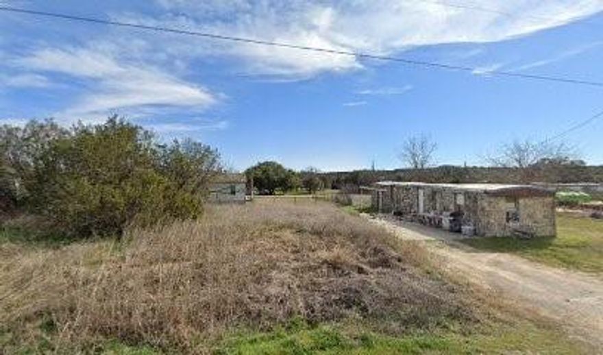 This beautiful lot is nestled in a vibrant community offering top-notch amenities for the whole family. Enjoy access to a serene fishing lake, boat ramp, sparkling community pool, playground, picnic area, soccer field, archery range and a welcoming community center. Located just minutes from the stunning Granbury Lake, this is the perfect spot to build your dream home or cabin and embrace an active, outdoor lifestyle.  www.comanchecove.com - for more information and maps