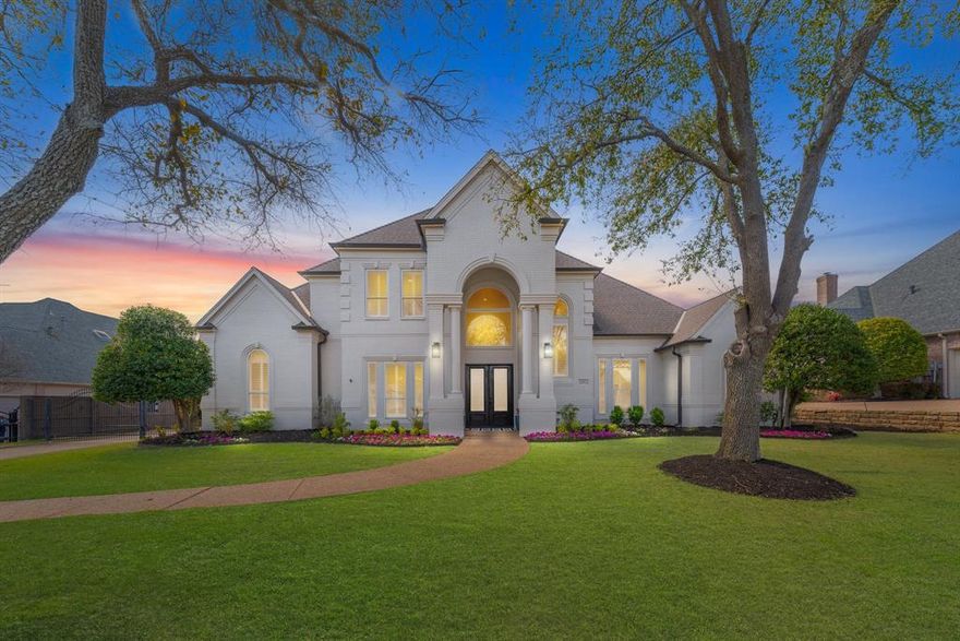 This stunning Southlake, fully updated estate home is nestled on a serene horseshoe street in the highly desirable Timarron Bent Creek neighborhood, just a leisurely stroll away from the inviting clubhouse, sparkling community pool, vibrant playground, sand volleyball area, and basketball courts. The home boasts modern curb appeal and exudes elegance with its remarkable design, showcasing beautiful wood-look tile floors that flow seamlessly throughout. The chef's kitchen is a culinary dream, featuring dual islands, pot-filler, sleek appliances, and exquisite finishes, making it perfect for both everyday cooking and entertaining. The family room is a warm gathering space, highlighted by a striking stacked natural stone fireplace that serves as a captivating focal point. Additionally, you'll discover a magnificent custom library-study with floor-to-ceiling shelves complete with a gliding brass ladder designed for both inspiration and productivity. Unique in design, this home includes a Babe Cave, a cleverly concealed third-level addition that serves as a versatile loft. This enchanting space can function as a fifth bedroom or a stylish office, complete with an exercise area for your Peloton, a cozy sitting area, and a dedicated built-in workspace. Step outside to the oversized backyard, where you'll find a newly finished pool and spa and a large, covered patio serving as the perfect retreat. Don’t let this spectacular home pass you by.