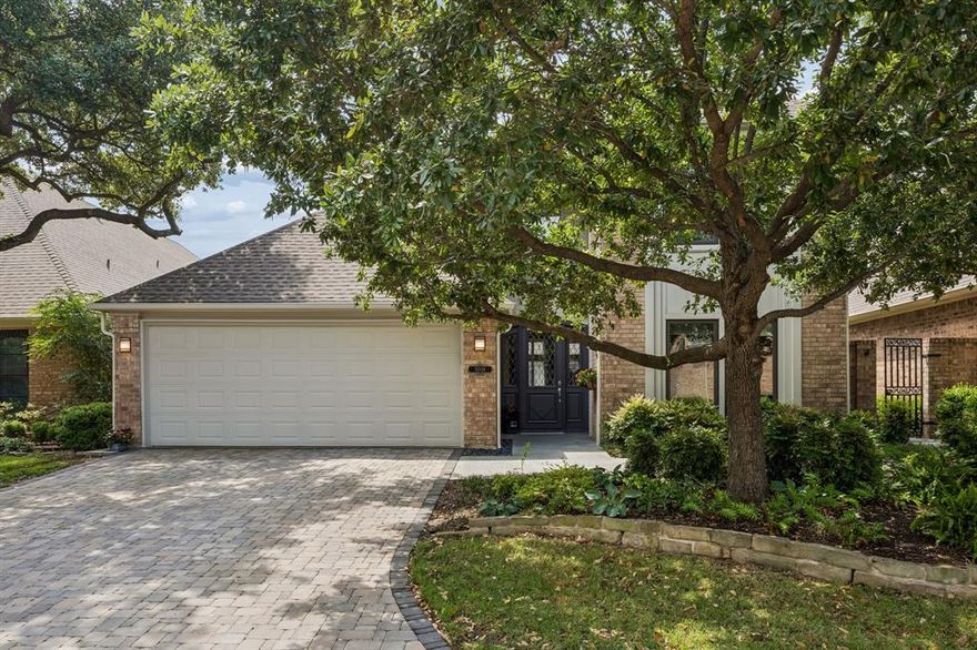 Completely remodeled custom home in coveted Bent Tree Village, steps from Bent Tree Country Club. This stunning property delivers the rare combination of privacy, low-maintenance living, and golf course community lifestyle in one of North Dallas's most sought-after neighborhoods.
A freshly installed stone paver driveway sets the tone the moment you arrive, adding to the polished curb appeal of this beautifully maintained home. Natural light pours through walls of windows and skylights, illuminating gorgeous hardwood floors throughout. Every bathroom and the kitchen have been thoughtfully renovated with quality finishes, including quartz countertops throughout. The chef's kitchen features sleek cabinetry, Bosch stainless steel appliances which include: dishwasher, oven, microwave-convection combo, and an induction cooktop.
Two versatile living areas both overlook a private courtyard, giving you the flexibility to use one as a formal dining room. One living space showcases soaring ceilings and a fireplace & the other offers built-in shelving and direct courtyard access.
The private courtyard is a true retreat, professionally designed by Bonick Landscaping and anchored by a lava fountain. Unique architectural details include trellis panels salvaged from an 1800s bank elevator cage. The backyard features a working herb garden and zinnia cutting garden, plus a gate to the greenbelt and golf course.
The primary suite includes a fireplace and a sitting area overlooking the courtyard, ideal for quiet mornings and winding down. Two additional bedrooms each have their own ensuite bathrooms, one on the first level and one on the second.
Turnkey, tasteful, and move-in ready. This is Bent Tree Village living at its finest. All information deemed reliable but Buyer or Buyer's Broker to verify all information and measurements.