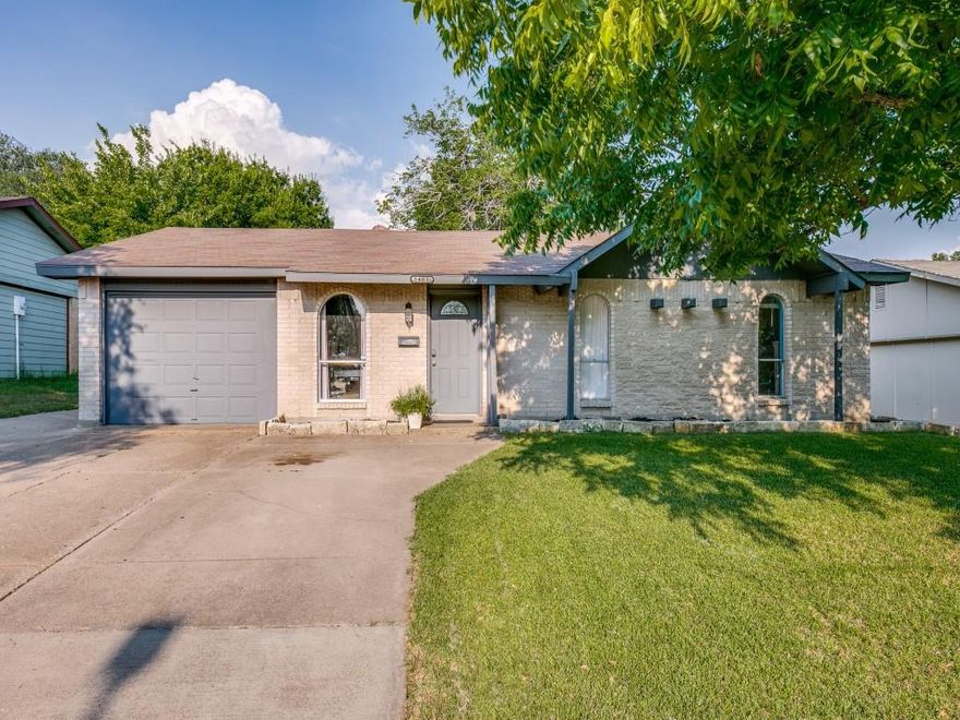 Move in ready!!!Three bedrooms, two full baths and a one car garage.Large grassy backyard is fenced.Flexible living, dining areas  that open to the kitchen with views of the backyard.