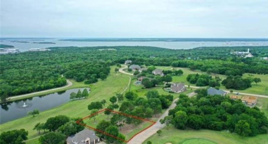 RARE OPPORTUNITY TO LIVE ON THE GOLF COURSE JUST 5 MINUTES FROM LAKE MARINA AND RESORT! Build your dream home on lot 37 in the gated Eagle Chase of Tanglewood subdivision. Unique lot with 14th green in front yard, and beautiful views of the 18th fairway and golf course lake and fountain view from the backyard. The sun sets over the golf course lake from your backyard view with stunning sunset views with marina tower in the background. Just 5 minutes away from the Tanglewood Resort featuring lodging, fine dining, a spa and a marina. Lot 38 directly adjacent to Lot 37 also available for purchase from same owner. Four new beautiful $1.5-$2M homes built over the past 2 years adjacent to and directly across the street on Palmer Lane. Only 1.622% per $100 tax rate.