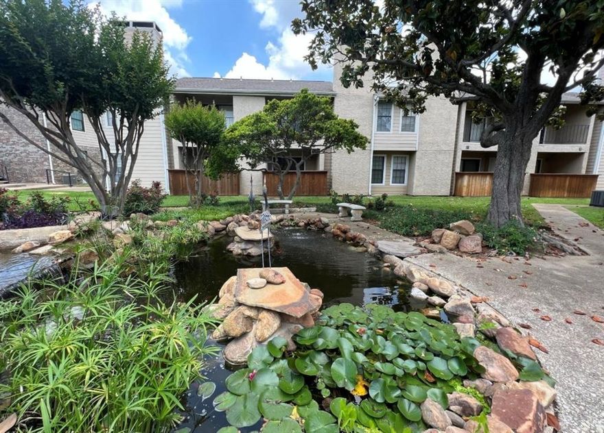Charming first-floor, one-bedroom, one-bath condo located in a gated community with an assigned covered parking space and an unbeatable location just off the North Dallas Tollway. This one-level home offers a bright, neutral color palette, 2-inch faux wood blinds, and stylish and easy to maintain wood look ceramic tile flooring in the entry, kitchen, and bath. The inviting living area features a cozy wood-burning fireplace with a beautiful ledgestone surround and wood mantle, creating the perfect focal point. The updated kitchen is designed for both style and function with granite countertops, crisp white cabinetry, large white subway tile backsplash, stainless steel appliances, and a granite breakfast bar ideal for casual dining or entertaining. The oversized bedroom includes a generous walk-in closet, while the bathroom offers a granite-topped vanity with ample storage and a tub and shower combination. Enjoy beautifully maintained community grounds with exceptional amenities, including a sparkling pool and serene water feature, all within a peaceful, well-kept setting. Conveniently located near shopping, dining, and major commuter routes, this condo combines comfort, style, and convenience in one fantastic package.