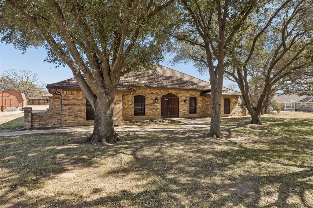 Photo of 241 Simmons Road, Double Oak, TX 75077 (MLS # 21189948)