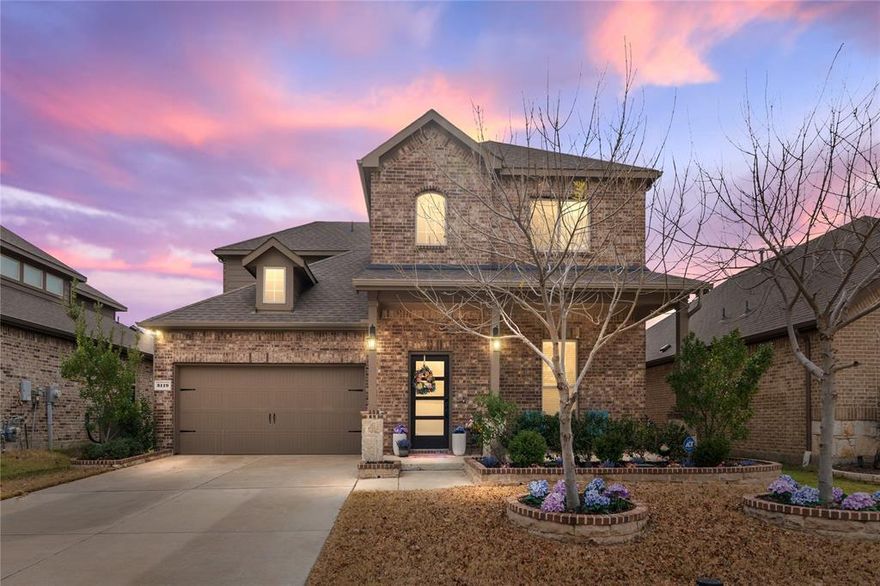 Welcome to this beautiful north-facing modern home nestled in the heart of the highly sought-after Lakeside at Heath community. From the moment you step inside, you’ll notice how effortlessly this home invites you in. Wood plank floors lead you through a bright, open layout designed for real life, busy weekdays, relaxed weekends, and everything in between. Just off the entry, a flexible formal dining space awaits, ready to become whatever your family needs most: a home office for quiet focus, a playroom filled with laughter, or a gathering space for shared meals and celebrations. At the center of the home, the spacious living room, anchored by a cozy gas log fireplace, flows seamlessly into a chef-inspired kitchen made for connection. Enjoy breakfasts around the oversized island, homework at the counter, and friends gathered while you cook with ease. Quartz countertops, abundant cabinetry, and thoughtful design make this kitchen as functional as it is beautiful. When the day winds down, retreat to the private primary suite, a peaceful escape designed for rest and renewal. The ensuite bath offers a spa-like experience with a soaking garden tub, separate shower, and a large walk-in closet that keeps life effortlessly organized. Upstairs, the home truly shines where a generous game room becomes the perfect spot for movie nights, game days, or quiet lounging, while three additional bedrooms, each with walk-in closets along with two full baths provide space and comfort. Step outside to a huge, grassy backyard, a blank canvas for backyard barbecues, soccer games, playsets, or simply watching the sunset as kids and pets run free. Located in Rockwall ISD and just minutes from schools, including a convenient in-community elementary, this home offers not just a place to live, but a lifestyle rooted in community, convenience, and comfort.