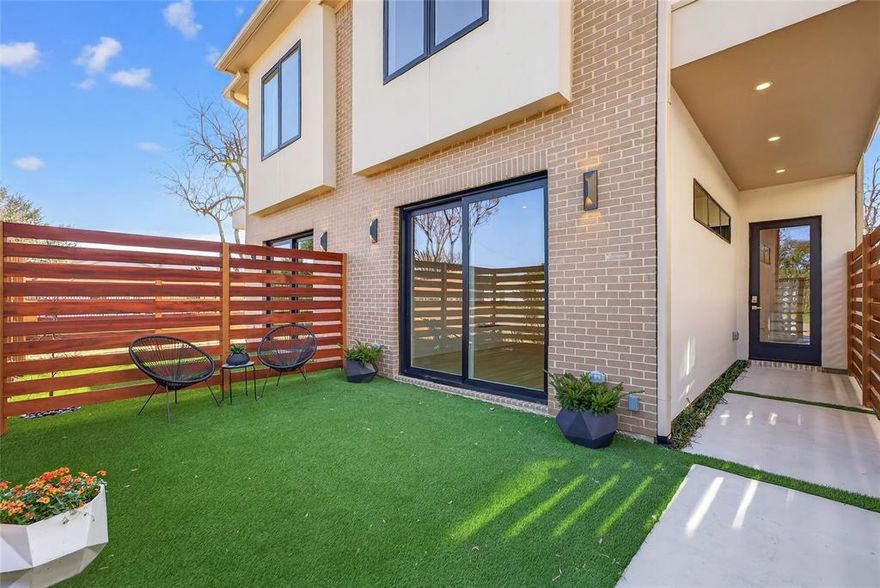 Welcome to this beautifully designed, newly constructed modern single-family attached home offering a perfect blend of contemporary luxury, thoughtful functionality, and an unbeatable location. Situated near Inwood and Lovers Lane, and just minutes from premier restaurants, shopping, and the Dallas North Tollway, this 3-bedroom, 2.5-bath residence puts you in the heart of convenience and style.
From the moment you step inside, you’ll notice the attention to detail and high-end finishes that define this home. Beautiful white oak flooring flows seamlessly throughout along with solid core eight foot doors, adding warmth and sophistication to the clean, modern aesthetic.  Level 4 finish walls ready to showcase your art work and a water vapor fireplace to be enjoyed year round.  
The open-concept kitchen is an entertainer's dream, featuring custom European-style cabinetry to the ceiling, sleek quartz countertops, and premium stainless steel appliances—including a microwave drawer, refrigerator, gas stove and a wine refrigerator. A built-in trash pullout system and thoughtfully integrated storage on the back side of island elevate both form and function.
All bathrooms exude modern elegance with floating vanities, designer tile, and contemporary wall-mounted commodes, creating a spa-like experience in your own home.
Upstairs, the spacious bedrooms are light-filled and offer ample storage including a built in desk with additional storage space. The primary suite is a private retreat with a beautifully appointed en-suite bath with wet room and free standing tub, generous closet space, and motion activated under vanity lighting.

A serene courtyard offers additional all year green space with landscape turf surrounded by tigerwood panels and a gate equipped with finger print scan and code lock for added security.

Additional highlights include energy-efficient systems, clean architectural lines, and a layout ideal for both entertaining and everyday living.