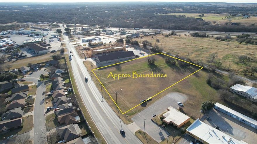 Prime 2.98 ACRES unimproved commercial land on Santa Fe Drive, a major thoroughfare in Weatherford. This property has significant frontage and exposure along a well-traveled route, offering exceptional potential for a wide range of commercial developments. Its location provides convenient access to local retail shopping centers, dining, and essential medical facilities, along with easy access to Interstate 20.  With Weatherford's continued growth and increasing demand for quality commercial spaces, this property represents a valuable investment opportunity.  Be sure to check out the Virtual Tour of the property.