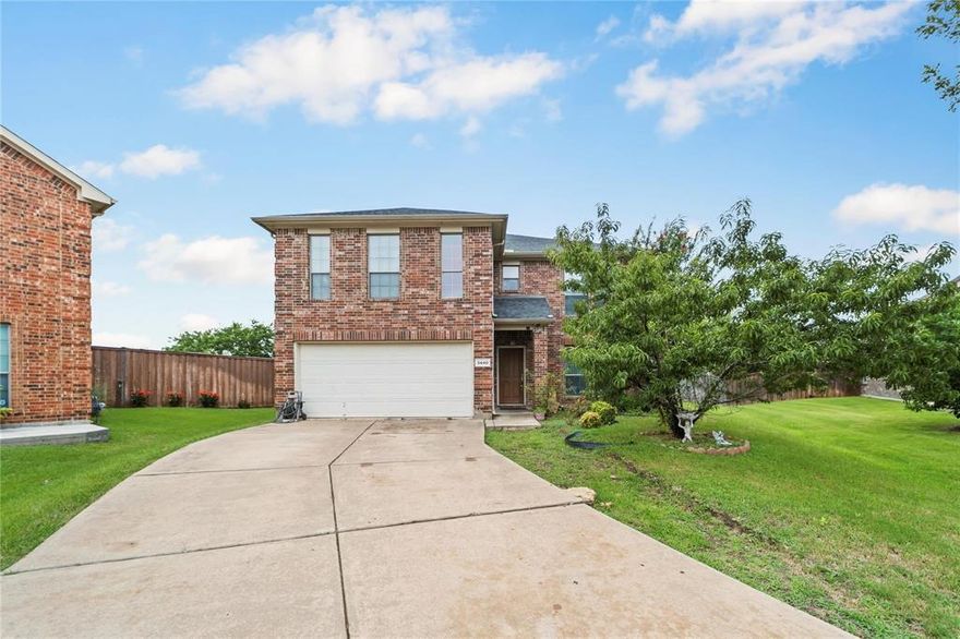 Welcome to a spacious two-story brick home located in the peaceful Fossil Park neighborhood of Fort Worth, TX. 

Step inside to a warm and functional kitchen featuring ample cabinet storage, black appliances, and tile flooring that opens into the family room ideal for entertaining. The kitchen overlooks a cozy living area complete with a fireplace and large windows for natural light.

Upstairs, you’ll find generously sized bedrooms and updated bathrooms, including a clean and bright full bath with a large mirror and dual lighting fixtures.

Out back, enjoy a covered patio with a custom-built wood pergola perfect for relaxing evenings or weekend BBQs. The large backyard offers mature trees, garden space, and plenty of room for outdoor fun, pets, or even future expansion.

All information deemed reliable but not guaranteed. Agent and buyers to verify all information contained herein.