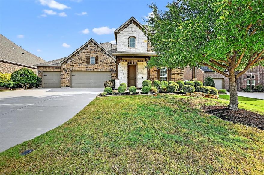 Welcome to 908 Rock Falls Dr, a stunning 4-bedroom, 3.5-bathroom home with over 3,600 square feet of thoughtfully designed living space, located in the highly sought-after masterplanned community of Trinity Falls in McKinney, TX. From the moment you step through the front door, you’ll be greeted by warm wood floors, soaring ceilings, and an inviting home office just off the entryway. The heart of the home is the open-concept kitchen and living area, where you'll find vaulted ceilings with exposed wood beams, a cozy gas fireplace framed by floor-to-ceiling stone, and large windows that flood the space with natural light. The kitchen is a chef’s dream, featuring a massive granite island, rich cabinetry, a gas cooktop, and double ovens—perfect for entertaining or day-to-day living. The oversized primary suite is tucked away on the main floor for added privacy and features a luxurious en suite bath with dual vanities, a garden tub, separate shower, and an expansive walk-in closet with custom built-ins. Upstairs, a spacious second living area provides extra room to relax or play, along with three generously sized bedrooms and a large attic room that is framed out and ideal for additional storage or future finish-out. Step outside and enjoy the show-stopping backyard, complete with a covered patio, an extended pergola-covered entertaining area, a tranquil waterfall, a built-in firepit with surrounding seating, and still plenty of grassy yard for play, pets, or gardening. Living in Trinity Falls means access to incredible amenities—walking trails, community pools and splash pads, a fitness center, playgrounds, dog park, lakes, and a calendar full of community events—all just minutes from historic downtown McKinney and major commuting routes. This home truly has it all—space, style, and an unbeatable community lifestyle.