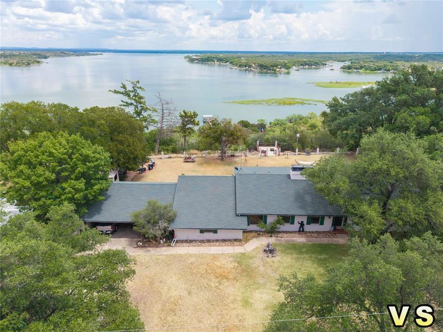 Stunning Lake Brownwood View Home  4 Bedrooms, 3 Bathrooms Enjoy the best view on Lake Brownwood from this spacious and versatile home. Wake up each day to soaring, panoramic vistas of the lake at its finest. Just a short walk or quick drive to the water, this property offers the perfect combination of privacy and convenience, tucked away at the end of a peaceful cul de sac. The large front yard and beautifully laid out backyard are ideal for relaxing or entertaining, with multiple sitting areas to soak in the scenery. A unique hidden room beneath the walk out deck provides a cozy retreat, while a fun tiki hut currently used as a tool room adds a playful touch. There’s also abundant parking and storage, more than you’ll find in most lake homes. Inside, this home offers generous living space for full time residence or weekend getaways. A large suite off the garage, complete with its own bedroom and bathroom, is perfect for guests or a mother in law quarters. The main home features three additional bedrooms, two bathrooms, a huge kitchen with granite countertops, two spacious living rooms with fireplaces, and a formal dining room that can easily serve as an office or extra bedroom. With endless possibilities, unmatched lake views, and room to spread out and enjoy, this property is ready for its next owner to make it their own.