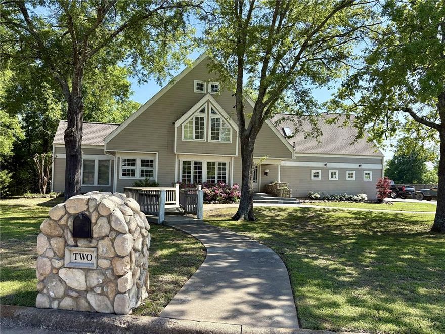 Welcome to 2 Jennifer Lane...A spacious and inviting home perfectly designed for busy families, entertaining, and everyday comfort.  Located in a quiet subdivision with friendly neighbors, This home sits just minutes from downtown, schools, and the hospital. The oversized one acre corner lot offers room to spread out with a covered front porch, two back decks, and a concrete walkway leading to a fire pit area...the perfect place to enjoy beautiful East Texas sunsets. Inside, the first floor features two living areas, two dining areas, a home office, mudroom, and an abundance of windows that fill the home with natural light. The kitchen offers a double apron sink, 5 burner gas range, and eat in kitchen booth for everyday living. Upstairs, you'll find four bedrooms and large laundry room. Two bedrooms include access to the third floor, bonus space ideal for a playroom or study area.  In addition, the third floor offers a game room or media room, creating even more flexible space for family, guest, or entertaining. Additional highlights include multiple hidden storage areas for seasonal decorations and oversized 3 car garage with work area and utility sink. Generous space and thoughtful layout for families with plenty of room for privacy, this home is truly built for making memories.