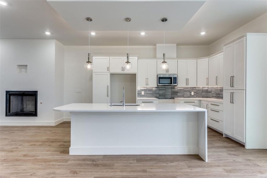 Introducing a limited collection of contemporary townhomes in the heart of Fort Worth’s Near Southside — an opportunity to be part of something truly special from the very beginning. Thoughtfully designed for a sophisticated urban lifestyle, this boutique community blends clean architectural lines with modern functionality and elevated design. Only two residences are being released at this time, offering early buyers the rare chance to secure a home in a highly anticipated development surrounded by Fort Worth’s most exciting growth. Each home features an open-concept floor plan filled with natural light from oversized windows, soaring 10’ ceilings in the main living area, and a seamless indoor-outdoor connection with a second-story seating area overlooking the private courtyard. Every detail reflects intentional living — from quartz countertops and stainless appliances to LED lighting throughout and flexible closets at each level designed for potential elevator conversion. The primary suite offers a refined retreat with a soaking tub, glass-enclosed shower, double vanities, and a spacious walk-in closet, while generous storage enhances everyday comfort. Residents will enjoy a shared patio and grill area, creating a welcoming space for gathering and connection. Energy-efficient features include a high-efficiency SEER 15 High Efficiency HVAC system, gas cooking, fireplace, dryer and tankless water heater, Low-E windows, and Energy Star roof tiling — delivering both luxury and long-term efficiency. Perfectly positioned between Downtown Fort Worth and the vibrant energy of West Magnolia Avenue, this location offers effortless access to TRE and TEXRail along with the acclaimed dining, entertainment, and cultural destinations of South Main and Magnolia. Experience the advantage of early ownership in one of Near Southside’s most exciting new communities. Schedule your private VIP showing today. A 2-BDRM is also available - #337 corner townhome.
