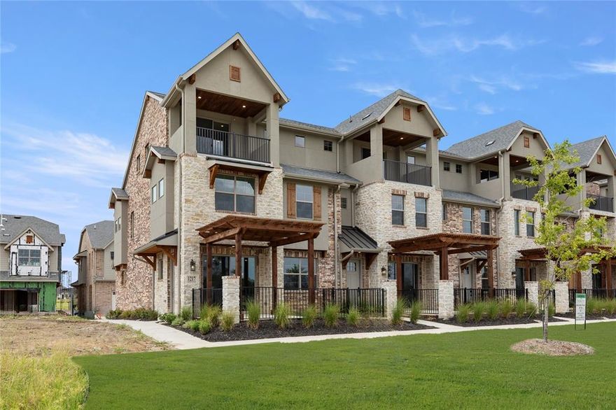 MLS# 21071108 - Built by Grenadier Investments - Ready Now! ~ Experience modern living in this stunning townhouse located in the highly sought-after Chelsea Green at The Tribute subdivision. This brand-new construction, completed in 2025, features 3 spacious primary bedrooms and 4 well-appointed bathrooms, including 2 full and 2 half baths. The inviting interior showcases vaulted ceilings, decorative lighting, and high-speed internet availability, perfect for today’s lifestyle. Enjoy cozy evenings by the gas fireplace in one of the two living areas. The contemporary design is complemented by a functional layout, which includes a dining area and a beautiful kitchen featuring elegant finishes. Enjoy the third-story patio with open and beautiful views. Outdoors, the landscaped lot offers a serene setting with a few trees. With a 2-car garage and central heating and cooling systems, this home effortlessly combines comfort and convenience. Located within the Little Elm ISD, close to prestigious schools, this townhouse is a prime opportunity for discerning buyers.