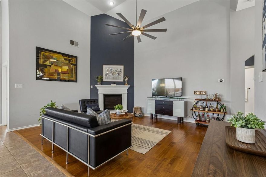 From the moment you step inside, this home stands out with its warmth, natural light, and thoughtfully updated finishes.
The main living area features 100 percent wood flooring, creating an elegant and inviting space enhanced by high ceilings and large windows. Throughout the bedrooms, you’ll find luxury vinyl plank flooring installed just one year ago, offering a modern, cohesive look with durability and easy maintenance—completely carpet-free.
The kitchen is both functional and welcoming, with ample cabinetry, generous counter space, and a layout that flows seamlessly into the living and dining areas—ideal for everyday living and entertaining.
Step outside to a beautifully upgraded backyard designed for enjoyment, featuring an extended concrete patio with tile finishes and a pergola, creating a perfect setting for relaxing evenings or hosting gatherings.