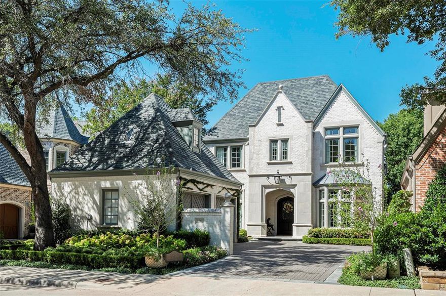 THE definition of a MASTERPIECE that meets the power of a sanctuary—a Preston Trails estate where every surface has been meticulously remodeled & upgraded with the finest materials & brands money can buy. De Gournay hand-painted wallpaper adorns the dining room wall like wearable art, while a John Richard chandelier & coordinating sconces cast an ethereal glow in the living room. The Palmer Industries custom wet bar &  half bath set the stage for effortless entertaining, while custom cabinetry—thoughtfully redesigned in both the kitchen & primary bath—showcases marble, limestone, & quartzite in a symphony of natural elegance. Custom silk drapes & motorized shades frame every window vista, California Closets deliver bespoke organization, & a Control 4 sound system orchestrates the perfect ambiance. Outside, Dallas' premier landscaper Harold Leidner has crafted garden style grounds. Many remotes for ease of maintenance. Expansive hardwood flooring & frame televisions blend seamlessly into the design narrative. The kitchen is a culinary haven outfitted with Sub-Zero, Wolf appliances, a Shaw farm sink, Thermador coffee maker, & a showstopper built-in banquette.  Venetian plaster ceilings and art lights transform the library music room into a gallery-worthy retreat, while the primary suite also with Venetian plaster walls showcases a wall of windows overlooking a sparkling pool & and the neighborhood's verdant greenbelt. Nestled in the guard-gated enclave of Cambridge Place on the north side of Preston Trails Golf Course & Country Club—with Bent Tree as your neighbor—this residence features exterior brick adorned with a custom German Smear color.  Every window offers a vista worth savoring. Here, style, quality, and attention to detail converge in a way rarely found for sale. Two primary suites, one downstairs and one upstairs.  Clever cloffice (closet & office meet for a fun space). Garage has epoxy floor, organization cabs & refrigerator & auto attic lift.