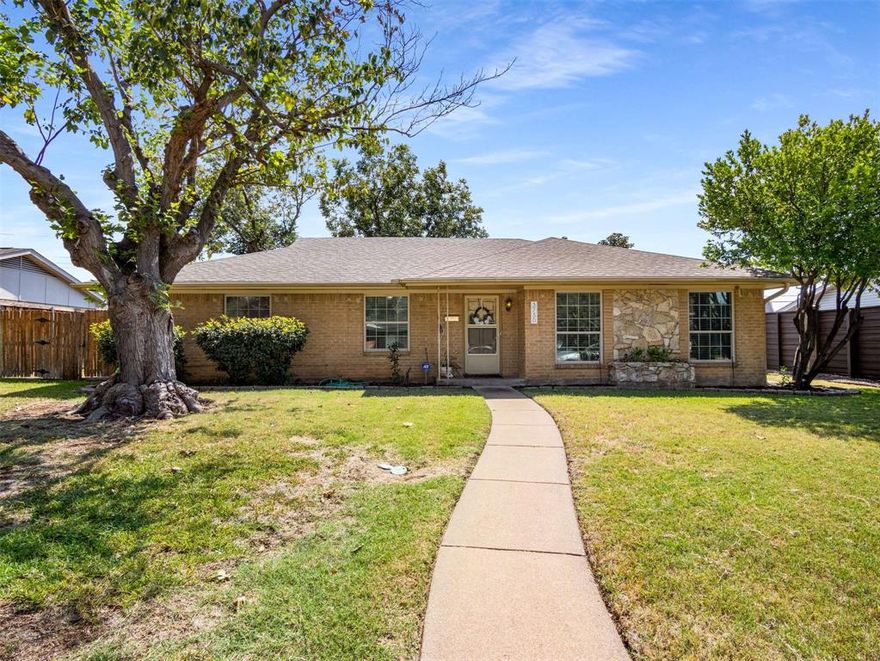 Welcome to Country Club Estates, where timeless design meets modern luxury. This beautifully appointed 4 bedroom, 2 bath home is ideally situated with premier access to the North Dallas Tollway and 635, placing shopping, dining, and recreation just moments away. Upon entry, you’re greeted by a spacious dining area or versatile flex space, offering endless options for formal entertaining or a refined home office. The bright, eat-in kitchen features sleek stainless steel appliances, a breakfast bar, and designer finishes, seamlessly flowing into the inviting living room. Here, engineered hardwood floors and custom wall-to-wall bookcases create both warmth and sophistication. The primary suite is a true retreat, highlighted by a custom-designed spa-inspired bathroom with an oversized shower, floor-to-ceiling tile, and exquisite designer touches. Three additional bedrooms and an elegantly updated guest bath provide comfort and style for family and guests alike. Step outside to a generously sized backyard, where a large covered patio invites effortless indoor and outdoor living, perfect for hosting gatherings or enjoying quiet evenings at home. With Brookhaven Jr. College, Brookhaven Golf Club, and Kerr Park nearby, this home offers an unparalleled lifestyle in one of the area’s most sought-after locations.