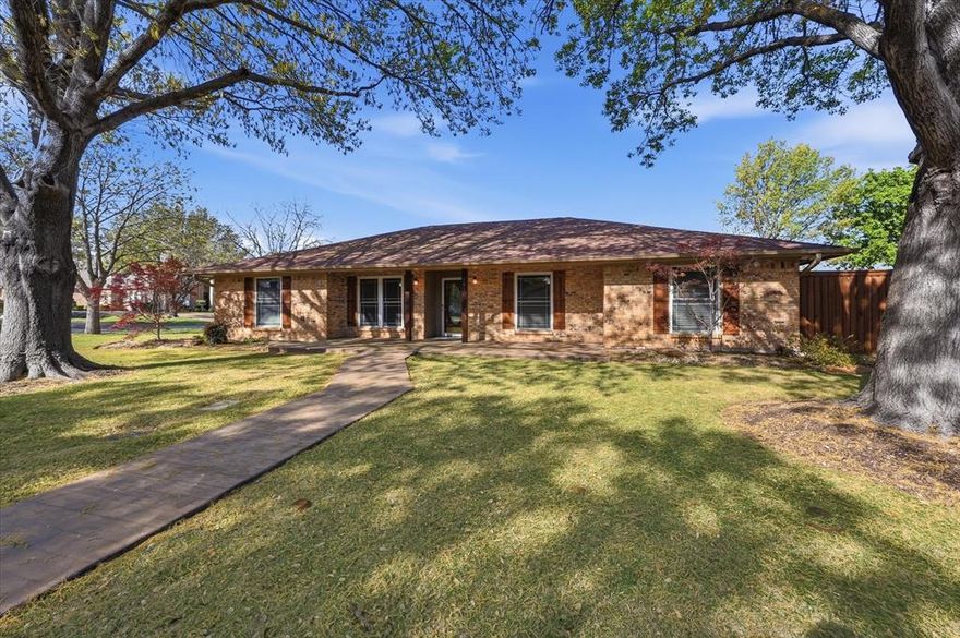 This beautifully refreshed home is ready to impress with fresh paint and new carpet! It's the stunning stained concrete floors that will stop you in your tracks. Recently polished to a rich, lustrous finish, these floors bring an upscale, designer aesthetic that flows effortlessly through the main living areas- durable, easy to maintain, and absolutely gorgeous.

The kitchen is the heart of the home & has been thoughtfully updated and is ready for everything from weeknight dinners to weekend gatherings.  The refreshed finishes give it a modern, polished look without losing that warm, welcoming feel that makes a kitchen the true center of a home.

Outside, this property delivers versatility and value that sets it apart. A generous driveway provides ample parking for multiple vehicles, guests, or even a boat. The standout feature is the detached flex space — a true bonus structure ready to become whatever you need most: a home office for the remote professional, a private studio for the creative, a workshop for the hobbyist, a she-shed retreat, a man cave, a gym, or a playroom! The surrounding covered storage area is perfect for neatly tucking away lawn equipment, tools, and outdoor gear. Beat the Texas heat this summer with the above-ground pool, which conveys with the home — ready for backyard entertaining from day one.

Located in Highland Village, you'd sit along the shores of Lake Lewisville, offering residents easy access to boating, fishing, and waterfront recreation. Enjoy a relaxing Trail System connects neighborhoods, parks, schools, and retail centers — ideal for walking, jogging, and biking. Highland Village Unity Park offers sports fields, playgrounds, and walking trails, and the community comes alive year-round with concerts, festivals, and neighborhood events.

Don't miss your chance to own a move-in ready home with flex-space potential in one of North Texas's most sought-after suburbs. Schedule your showing today!