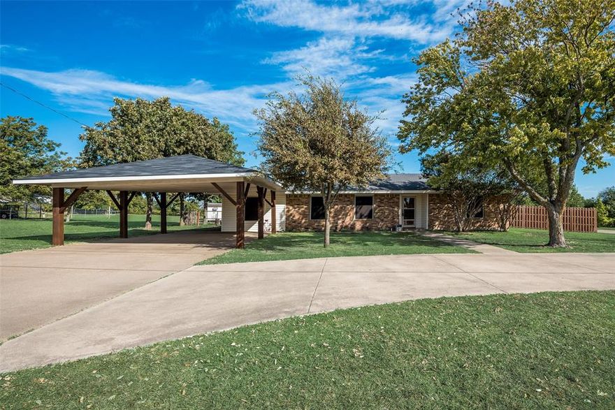 Buyers financing fell thru!! Country living in the city! Don't miss this affordable home! Well maintained 1 acre home with circle drive and extra parking for all your guests! Great eat in kitchen has smooth top range. Breakfast bar, custom cabinets and more! Split bedroom floor plan with modern light fixtures plus Solar Screens, Vinyl siding, laminate flooring and gutters. Home offers plenty of storage. Covered patio overlooks garden and huge fenced back yard with storage shed. Nice utility room with custom cabinets. Seller is replacing the roof.Easy access to shopping and freeway. Ready to move in!