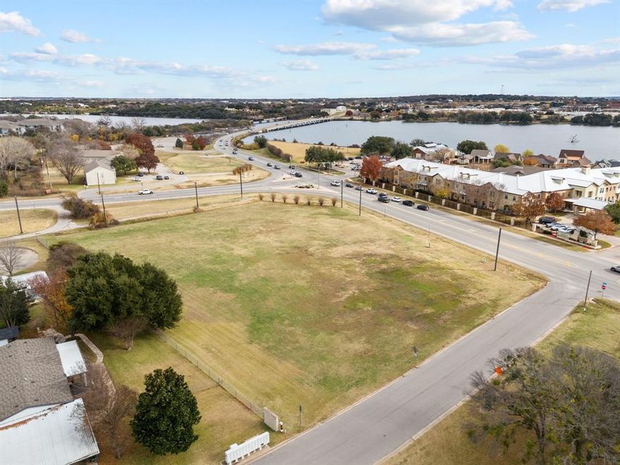A great opportunity to own one of the PRIME commercial properties this close to the Granbury downtown area. This place sits only minutes  from the Historical Granbury Square. The land is cleared and waiting for the next addition to the downtown area to be built. Property offers incredible visibility as it sits on a HARD CORNER with HIGH TRAFFIC. 
A great view of Lake Granbury and walking distance to the Granbury City Beach.
