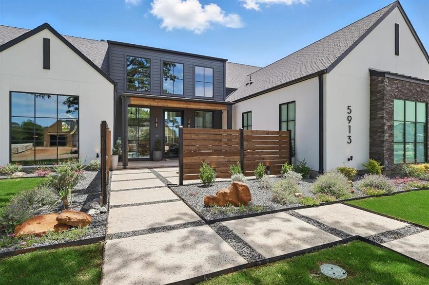 Stunning one story SMART HOME with 4 CAR GARAGE & PICKLEBALL COURT, designed for seamless indoor-outdoor living & entertaining. Out front there's a gated courtyard offering privacy & sunset views. This architecturally designed modern home has high ceilings, hardwood floors, gorgeous custom lighting, wood beams, plenty of storage & floor to ceiling wood-wrapped Pella windows & sliders. The grand family room has an elegant 74-inch Napoleon Vector fireplace & an impressive wall of windows overlooking the spacious outdoor living areas. Designed for both luxury & functionality, the home features an expansive kitchen with its XL island, 6 burner Thor gas range with double ovens, & custom cabinetry. The adjacent prep kitchen has an additional dishwasher, a microwave & space for 2nd fridge, making this a true culinary delight! The vaulted, beamed primary bedroom offers views of the backyard, while the bathroom exudes luxury with custom XL DOUBLE ENTRANCE SHOWER, soaking tub, 2 SEPARATE WATER CLOSETS & 2 WALK IN CLOSETS with EXPANSIVE CUSTOM BUILT INS. Ensuite 2nd & 3rd bedrooms, 4th bedroom-office features floor to ceiling window, wall of built-ins & a SECRET ROOM!  XL game flex room at the rear of the home.  Laundry room has dog washing station, 2 separate garage entrances (with epoxy flooring and EV outlets). The back does not disappoint with the beautiful private travertine patio, with PICKLEBALL COURT and TOURNAMENT LIGHTING. 

SMART HOME FEATURES that can be controlled on apps:  Doors (including garages), lighting, motorized blinds, sound system, tvs, alarm system, heating & cooling, Lorex cameras, speakers (Sonos). Conveying: washer & Dryer, some flat screens & sound bars; smart home components.