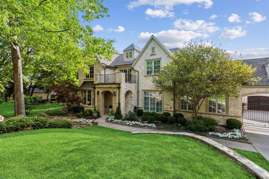 Welcome to this exquisite estate in the coveted Stone Creek Estates neighborhood, located within the prestigious Lovejoy ISD. Originally built with exceptional craftsmanship and meticulous attention by Tim Jackson as his personal residence in 2006, and masterfully and luxuriously renovated by the current owners in 2024. In addition to the spectacular main residence, this estate also offers a two-story 1,600 sq ft guest house with its own parking and private entrance. Stunning chef's kitchen is a true showpiece, featuring a 16-foot Nassau quartzite island, Cristallo quartzite perimeter counters, TrueBrand refrigerator, freezer, wine fridge combo, 6-burner Wolf range with double ovens, custom metal and brass hood, 2 dishwashers, brass Waterstone faucets, designer lighting, wet bar with ice maker and beverage fridge, and a coffee bar. The soaring living room welcomes you with a stone gas-burning fireplace, beamed architectural ceilings, and breathtaking built-ins. Your primary retreat offers a luxurious escape, with a fully renovated spa-like bathroom, serene bedroom with private balcony, and his-and-hers closets that rival a boutique. Two-story office leads to an upstairs library. Upstairs secondary rooms each feature unique custom details and ensuite baths. Main home also includes a spacious game room (with option to be an extra bedroom), breakfast area with charming window seating, formal dining room, wine cellar and tasting room, media room with updated AV equipment and full bar, and an oversized craft room. Situated on a tranquil 1.5 acre, heavily treed lot with stunning landscape lighting, this property is an entertainer's dream, including an outdoor kitchen, saltwater pool, putting green, firepit, two-story treehouse, covered patio with fireplace, & more. You'll never want to leave this magnificent retreat!