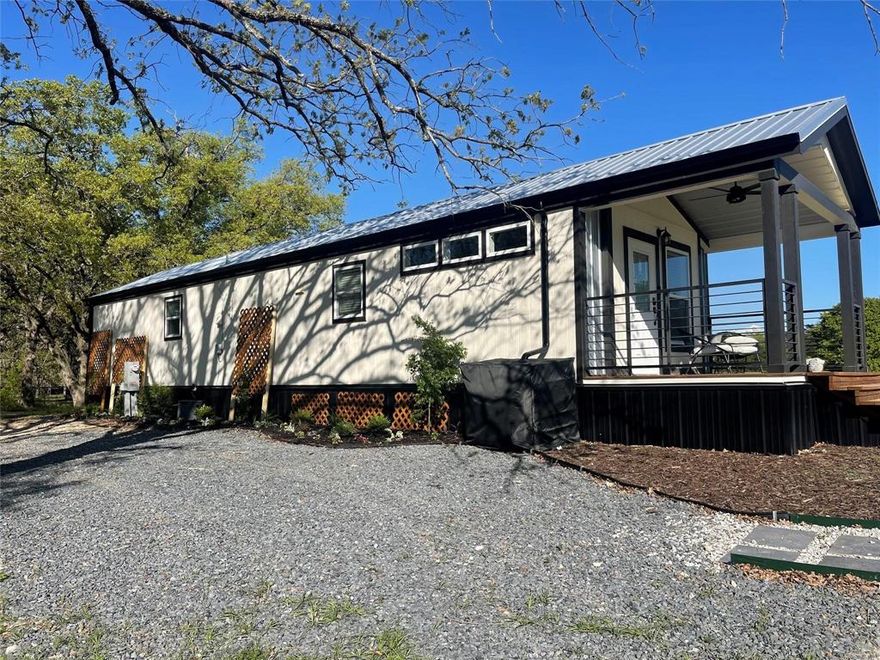 BUYER COULD NOT CLOSE LOAN! MOTIVATED SELLER! Seller Fi option with considerable down pmt. Adorable 2-1 home in quiet countryside. Beautiful 1 acre lot with a few fruit trees and plenty of shade from manicured trees.  Large, fenced pet run with two kennels attached. Used for short term rentals and has all appliances including washer and dryer.  Great get away location; rental income; or cozy home away from city noise. Taxes are VERY LOW making this easily to afford!