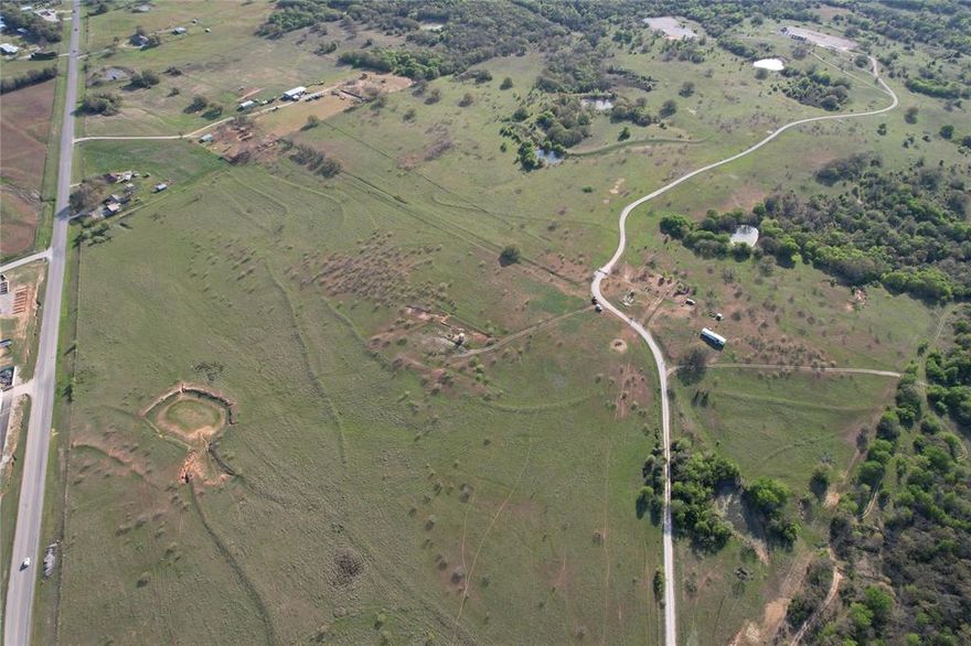 This expansive 183-acre property offers a unique opportunity for developers, investors, or those looking to build a private retreat, minutes from the thriving city of Decatur. The property features approximately 1,928 feet of prime road frontage along FM 51, providing easy access and excellent visibility. With diverse terrain, including open fields and scattered tree cover, the land presents numerous possibilities for residential, commercial development, agricultural use, or recreational purposes. The proximity to Decatur ensures convenient access to city amenities, schools, and services, yet remains a peaceful, rural setting.
This property is a rare find with endless potential, making it an excellent investment in one of North Texas's rapidly growing areas. Whether you're looking to create a residential community, start an agricultural operation, or simply enjoy the wide-open spaces, this land is a must-see.