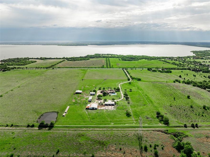 Sitting on roughly 27 acres of beautiful pastureland within the city limits of Sunnyvale, framed by elegant white fencing along Polly Rd, and a tree lined drive, the property is an ideal primary residence or investment property. The 4,792 square foot house and various equestrian-related improvements sit roughly 2,000’ back from the road which allows for fantastic sunrise views while maintaining a sense of privacy. The property is surrounded on all sides by a large ranch, which helps preserve the sense of isolation while being minutes away from the heart of Sunnyvale. The property features two barns with horse stalls and turnouts for buyers interested in equestrian pursuits. The location between Interstate 30 and US 80 along with proximity to Lake Ray Hubbard make this property a great investment opportunity as growth continues to expand from Sunnyvale. Buyers will note that access to water utilities from the road, and amenities located nearby further increase the investment potential of the ranch.