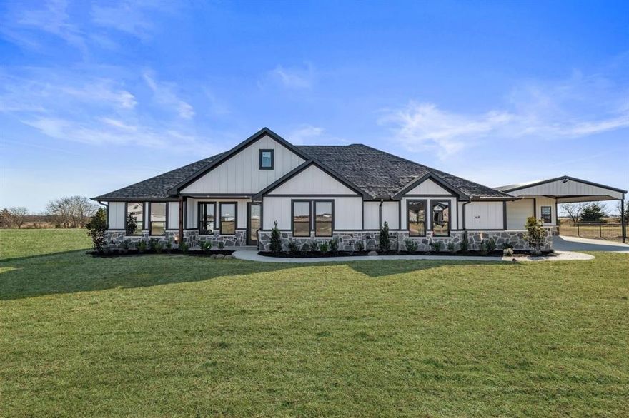 Custom-built masterpiece boasts stunning open floorplan with 30X50 Electric Workshop that includes a half bath. NO HOA on Acreage. Step inside to find soaring cathedral ceilings, rich wood beams & magnificent quartz stone fireplace. Luxurious master suite offers a spa-like bathroom complete with frameless glass shower sleek modern tile, & dual quartz sinks. Enormous built-in closet provides lots of storage space. Open-concept kitchen, features large walk-in pantry, trendy backsplash, elegant quartz countertops, shaker cabinets that extends to ceiling with glass upper cabinets & backlit lighting. Situated on over 1.396 acres, offering a serene country setting with mature trees, providing plenty of room for kids to play, family gatherings, or relaxing on the huge covered patio. Experience a perfect blend of luxury & tranquility in this modern farmhouse. Built with the highest energy efficiency in mind, home includes encapsulating foam insulation & sits on a durable peered & slab foundation, ensuring long lasting quality & comfort.