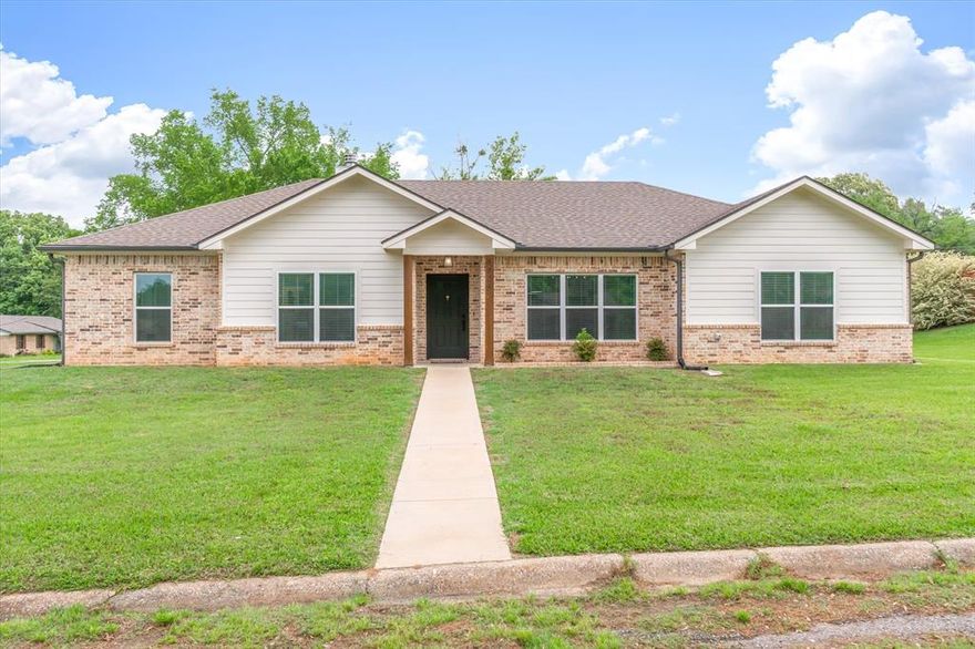 Check out this beautiful 4 bedroom, 2 bath home built in 2022 and situated on a spacious 0.340 acre corner lot. This home is in absolutely amazing condition. Modern, open layout perfect for everyday living and entertaining. The living room features a cozy gas fireplace. Primary suite includes a walk in shower and garden tub for unwinding after a long day. Other bedrooms great for guests, children, or office spaces. Come see this rare 4 bedroom home before its gone!