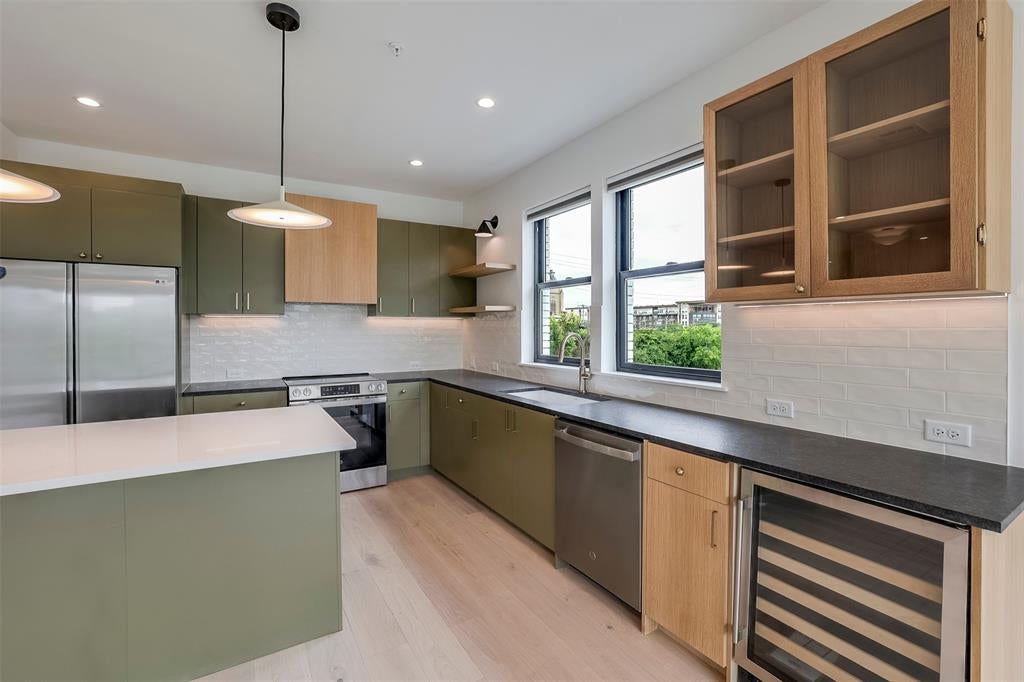 Photo of 309 W Daggett Avenue #205, Fort Worth, TX 76104 (MLS # 21306635)