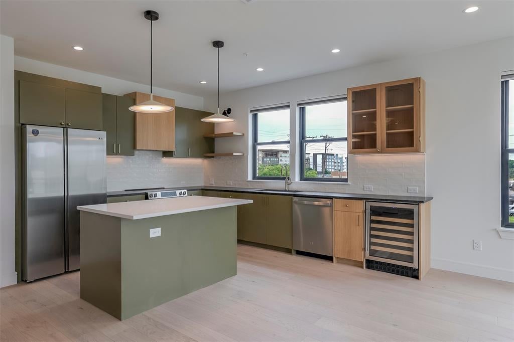 Photo of 309 W Daggett Avenue #205, Fort Worth, TX 76104 (MLS # 21306635)