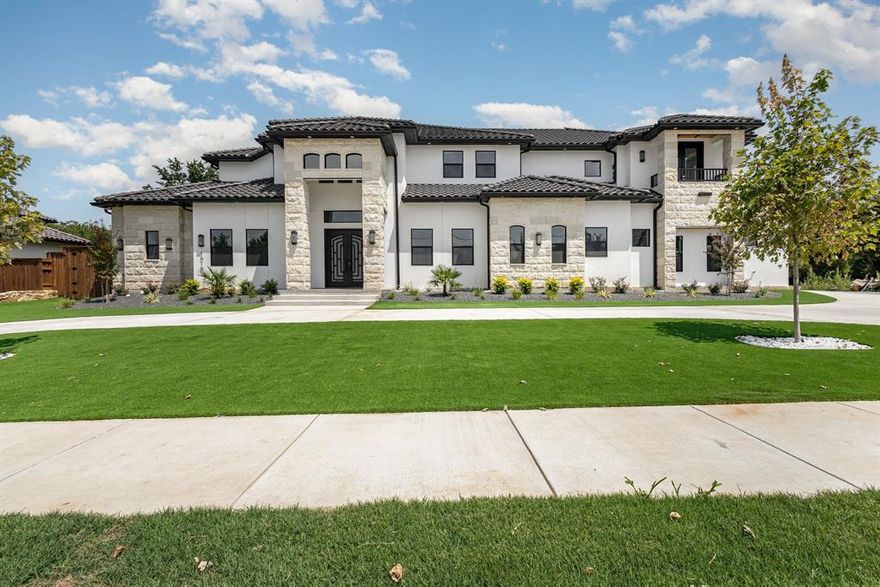 Step into this custom estate in Colleyville—one of the safest and most desirable cities in Texas—where Victorian charm meets Mediterranean elegance and modern luxury. Situated on a private, non-subdivision lot with no HOA, this extraordinary home features a circular driveway, black Spanish tile roof, and two open-concept kitchens (main and prep) with quartz countertops and premium Thermador appliances. The expansive 4-car epoxy garage, rear balcony with fans and electric fireplace, and a second balcony overlooking the front offer both style and function. Inside, every bedroom you'll find a walk-in closet, private ensuite bathroom, and smart curtains (optional), while all bathrooms are appointed with rain showers, smart mirrors with light and defogger buttons, and waterfall faucets. Smart toilets that provide auto flushing, temperature display, and heated seats enhance the half-bath and primary bath, and in-wall speakers add ambiance to both the family room and the luxurious primary suite. Additional highlights include a walk-in wine cellar, black-walled theater, two media rooms (including a 338 sq ft flex space), a home office with built-in shelving and a clothes rack, and an upstairs game room with filtered water, sink, and mini fridge. In total, the property contains 3 water filters with tankless water heaters that offer energy efficiency, a longer lifespan, and endless hot water on demand. The family room is anchored by a striking floor-to-ceiling black porcelain fireplace, and the outdoor kitchen offers granite counters, a double-burner grill, and a covered patio with ceiling fans. Designer lighting throughout, glass sliding doors for maximum natural light, natural and synthetic landscaping, and generous storage complete this one-of-a-kind residence in a prime location. Schedule your private tour today and experience elevated living.
**THE AGENT IS RELATED TO THE SELLER**
**A CUSTOM POOL WILL BE BUILT ONCE THE HOME IS PURCHASED**