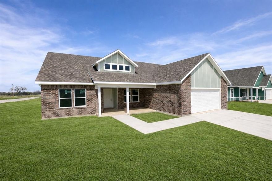 Welcome to 613 Crockett in Cleburne a brand-new home currently under construction in an exciting new community!
This thoughtfully designed 3-bedroom, 2-bath residence offers a modern open-concept layout perfect for both everyday living and entertaining. The home will feature a stylish combination of brick and siding exterior, delivering both durability and curb appeal. Inside, you’ll find a bright and inviting kitchen complete with crisp white cabinetry, sleek black hardware, and included appliances such as a microwave range and refrigerator — making this home move-in ready. The open living and dining areas create a seamless flow, ideal for gathering with family and friends. With quality finishes throughout and attention to detail, this home blends comfort and contemporary style. Located in a brand-new community with other new construction homes selling quickly, this is a fantastic opportunity to get in early and secure your place in a growing neighborhood. Starting at $293,000, this home offers exceptional value. Please note: This home is subject to income restriction guidelines. Buyers are encouraged to review all requirements and qualifications with the realtor. Don’t miss your chance to make this beautiful home yours, inquire today for more details and estimated completion timeline!