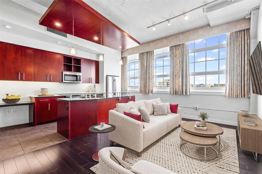 Your pied-à-terre awaits! This super urban-luxe condo at Montgomery Plaza Residence #1535 is a stylish 1-bed, 1-bath condo spanning 946 SF in the iconic 1928 brick-and-concrete structure minutes from Fort Worth’s vibrant Cultural District. Step inside to discover a contemporary design complete with wood, tile, and carpet flooring; a galley kitchen with dual sinks, stone counters, pantry, and built-in fridge - modern fixtures and designer lighting and contemporary flair. The bathroom features dual sinks, separate shower and oversized garden tub. Montgomery Plaza Residents enjoy 24-hour concierge, the city's largest rooftop pool deck, wellness facility, and a 15-seat theater on the amenity level. With frontage stretching across the West 7th corridor’s retail, cultural, and dining hubs — including Target, Crockett Row, Dickies Arena — plus easy access to Downtown in under 7 minutes, this unit blends modern convenience, creative energy, and boardwalk-style urban village lifestyle. Convenience is everything at Montgomery Plaza! Come see why this building is continuing to thrive with luxury living mixed with a fast pace lifestyle!