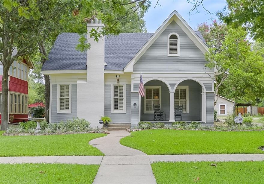 **MOTIVATED SELLER! SELLER TO PROVIDE $10k BUYER ALLOWANCE AT CLOSING ANY WAY THE BUYER WANTS TO USE IT WITH ACCEPTED OFFER**Full of charm, character, and unexpected space—welcome to 311 E Marvin near historic, downtown Waxahachie! This adorable two-story historic home offers much more than meets the eye. Situated in a prime location, it boasts a flexible and spacious floor plan with 4 bedrooms plus an office—or use it as a 5-bedroom home! The primary suite is located downstairs and features an ensuite bathroom and an adjoining flex room that can serve as a private sitting area, office, nursery, or even a mother-in-law suite. Upstairs, you’ll find secondary bedrooms along with their own dedicated living space—perfect for a playroom or teen hangout. Designed for both everyday living and entertaining, the home features two dining areas and loads of historic character throughout. Step outside and you’ll fall in love with the established backyard, sparkling pool, and outdoor kitchen—ideal for enjoying Summer. The detached oversized two-car garage includes a bonus storage room, giving you extra space for hobbies, tools, or seasonal items. The interior& exterior were painted in 2025, and the roof was replaced in June 2025. Homes like this—with such warmth, flexibility, and curb appeal—don’t come along often. Come see the charm for yourself!