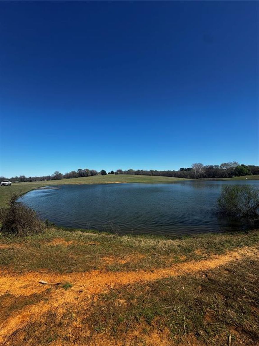 Discover 50.03 scenic acres designed for those seeking space, serenity, and opportunity. With a stocked lake and rolling pasture, this property is ideal for building your dream private estate, establishing a working ranch, or creating the ultimate recreational retreat.